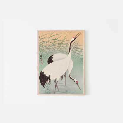 Dos grullas y una puesta de sol de Koson